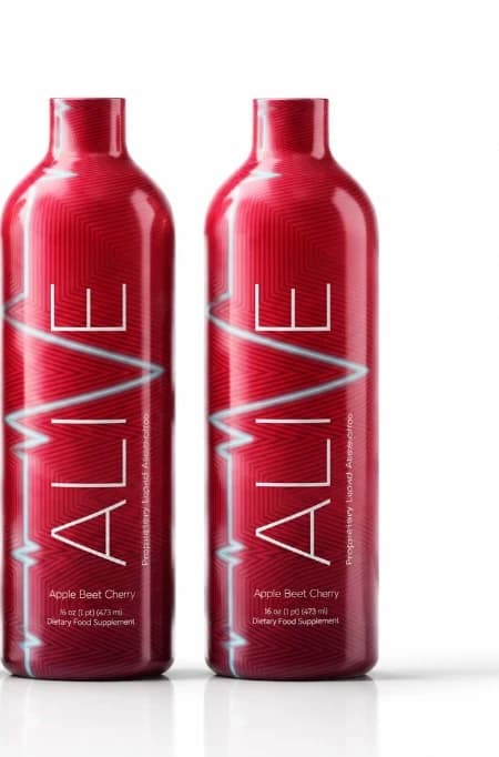 Two Alive ABC Apple Beet Cherry crimson bottles